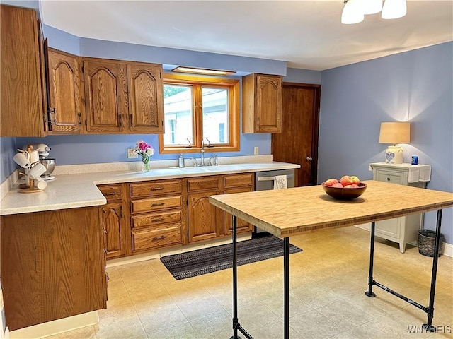 40 June Dr, Elma, NY 14059 - kitchen featuring brown cabinets and light countertops