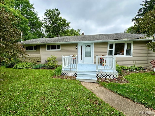 40 June Dr, Elma, NY 14059 - view of front facade featuring a front lawn and a chimney