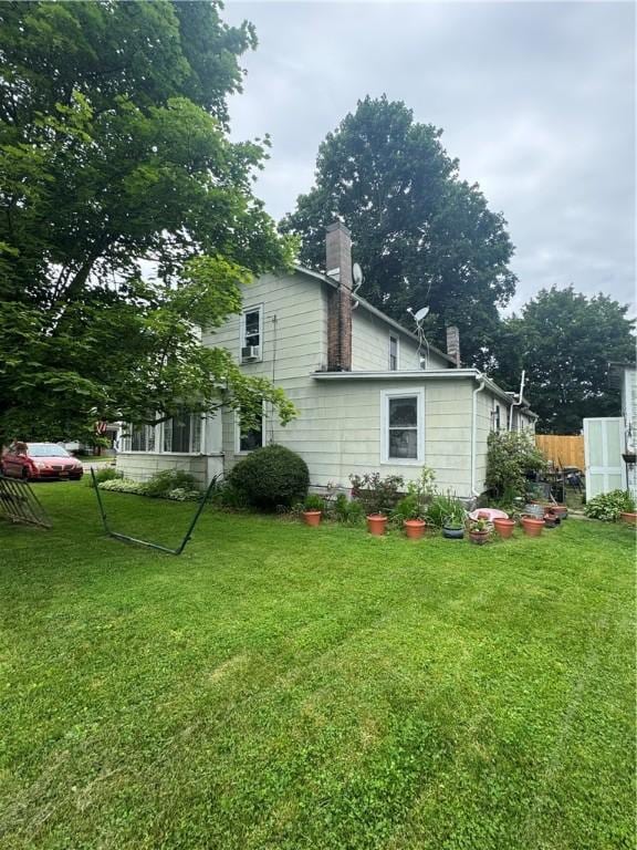 204 Owego St, Montour, NY 14865 - rear view of house with a chimney