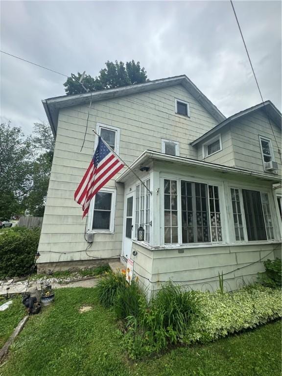 204 Owego St, Montour, NY 14865 - rear view of house featuring a sunroom