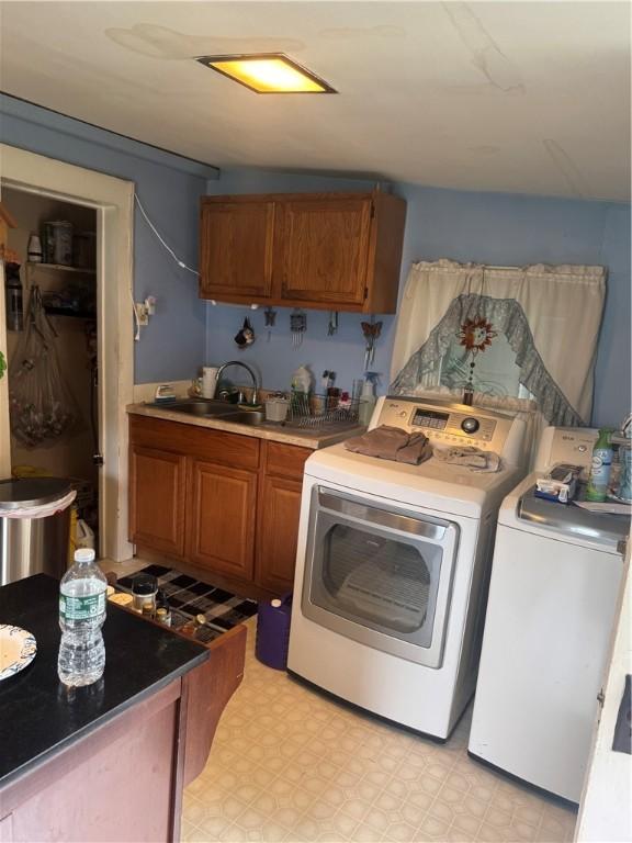 204 Owego St, Montour, NY 14865 - laundry area featuring a sink and washer and clothes dryer