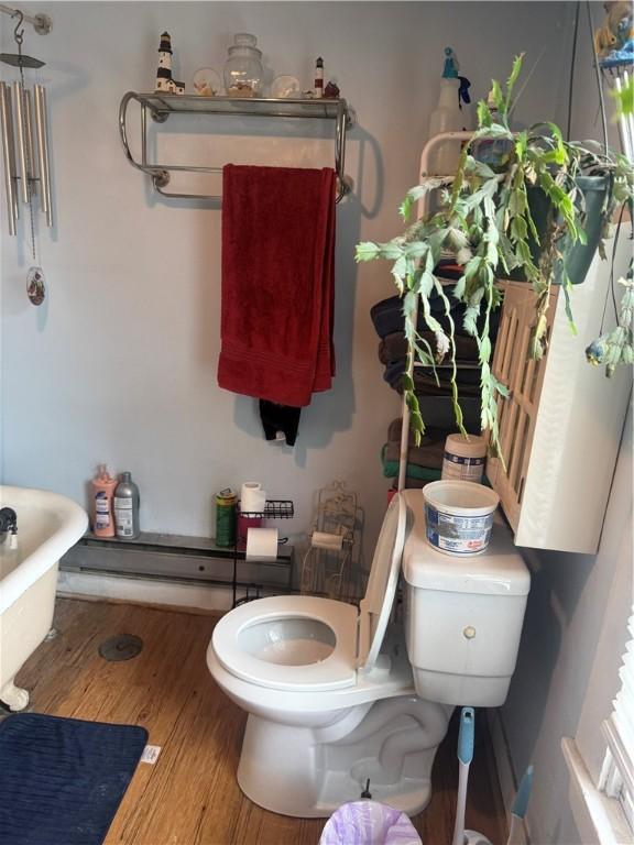 204 Owego St, Montour, NY 14865 - full bathroom with a soaking tub and wood finished floors
