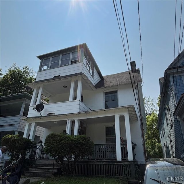 106 Bellaire Pl, Syracuse, NY 13207 - view of front of property featuring covered porch and stucco siding