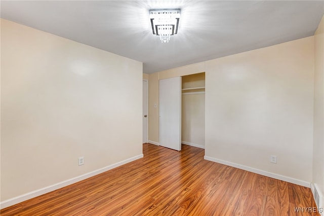 35 Kendale Rd, Cheektowaga, NY 14215 - unfurnished bedroom with a closet and wood finished floors