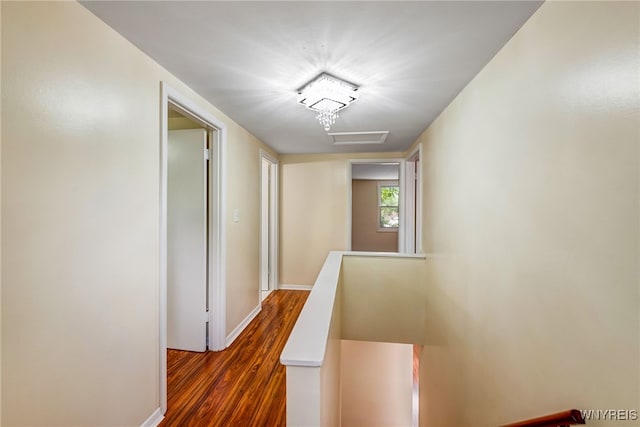 35 Kendale Rd, Cheektowaga, NY 14215 - hallway with an upstairs landing and dark wood-style floors
