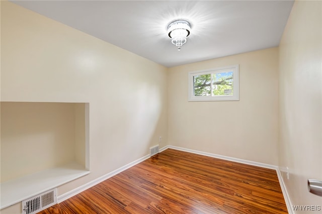 35 Kendale Rd, Cheektowaga, NY 14215 - empty room featuring wood finished floors and baseboards