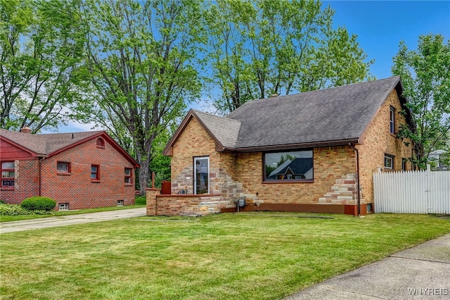 35 Kendale Rd, Cheektowaga, NY 14215 - view of front of house with roof with shingles, brick siding, and concrete driveway