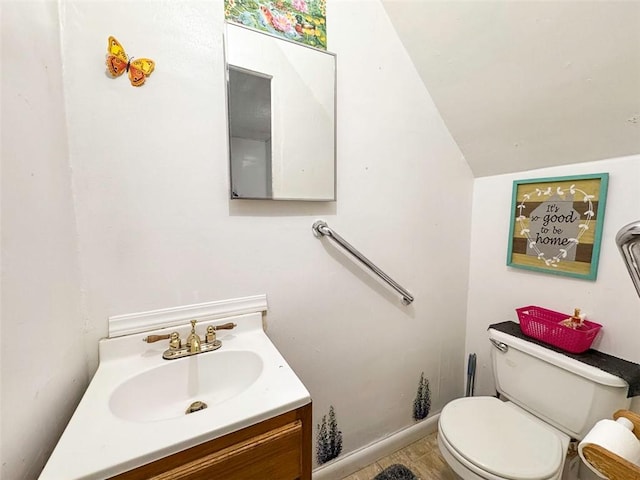 149 Post Ave, Rochester, NY 14619 - half bathroom featuring vanity and vaulted ceiling