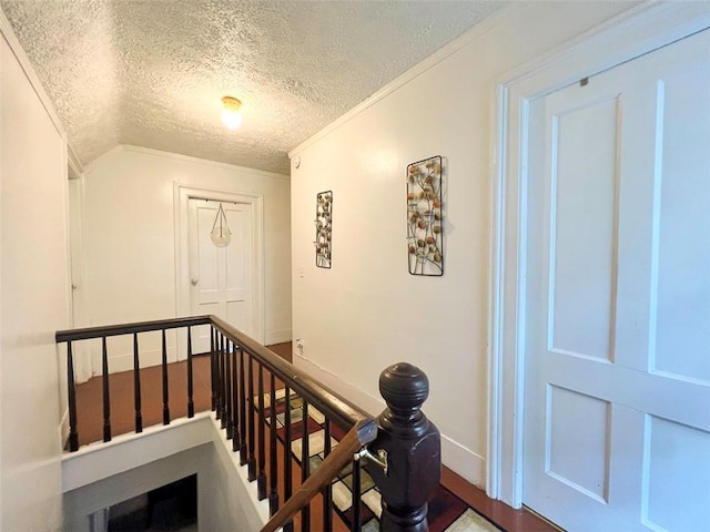 149 Post Ave, Rochester, NY 14619 - staircase with a textured ceiling and ornamental molding