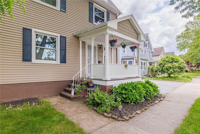 70 Field St, Rochester, NY 14620 - property entrance featuring a porch