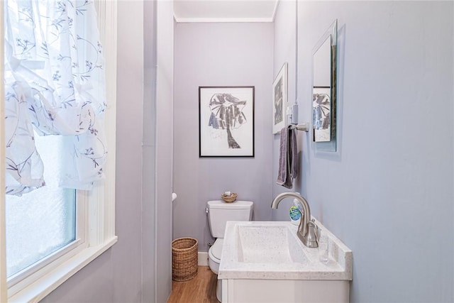 70 Field St, Rochester, NY 14620 - bathroom featuring wood finished floors and ornamental molding