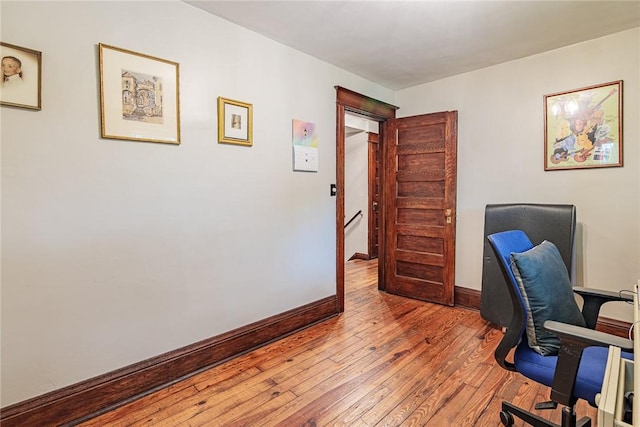 70 Field St, Rochester, NY 14620 - home office featuring wood-type flooring and baseboards