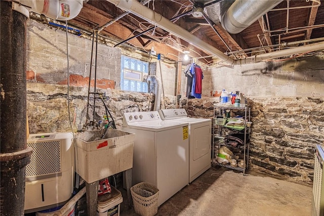70 Field St, Rochester, NY 14620 - laundry area with washing machine and clothes dryer and heating unit