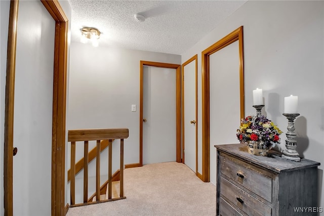 197 Shellridge Dr, Amherst, NY 14051 - hallway featuring carpet flooring and a textured ceiling