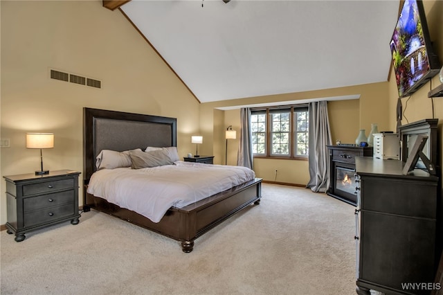 197 Shellridge Dr, Amherst, NY 14051 - carpeted bedroom with high vaulted ceiling, beamed ceiling, and a glass covered fireplace