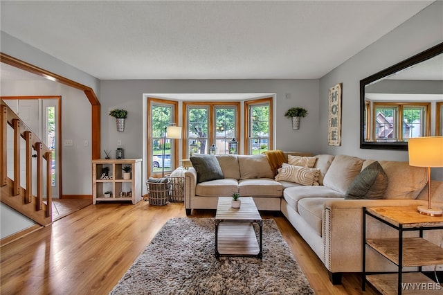 197 Shellridge Dr, Amherst, NY 14051 - living area featuring light wood-style flooring and stairway