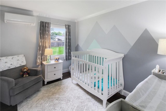 133 Berkley Ln, Horseheads, NY 14845 - bedroom with a wall mounted AC, a nursery area, ornamental molding, and wood finished floors