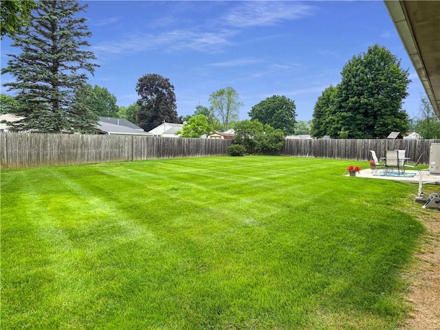 133 Berkley Ln, Horseheads, NY 14845 - fenced backyard featuring a patio