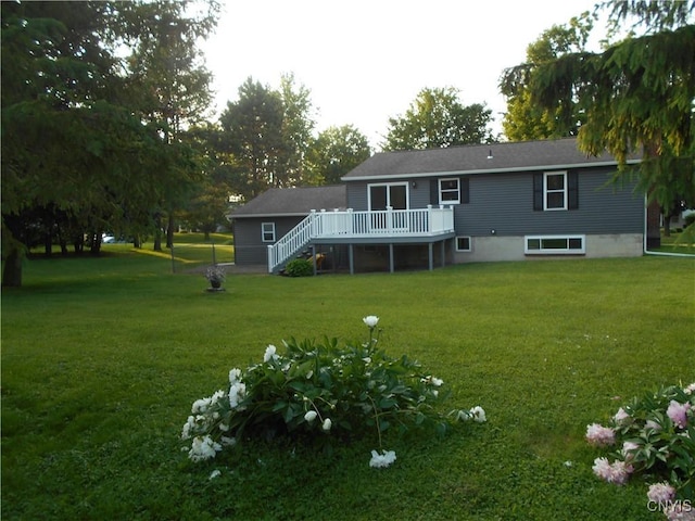 1003 Rondo Ave, Sullivan, NY 13037 - back of property with a deck, a yard, and stairway