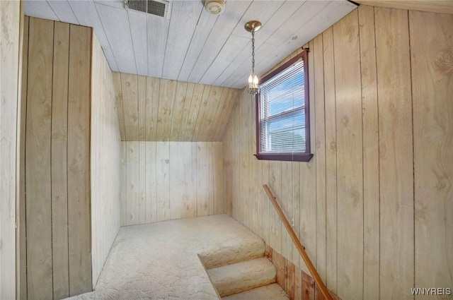 464 Rowley Rd, Cheektowaga, NY 14043 - bonus room with wood walls, lofted ceiling, and carpet flooring