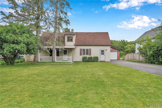 464 Rowley Rd, Cheektowaga, NY 14043 - view of front of house with covered porch, a chimney, and an outbuilding