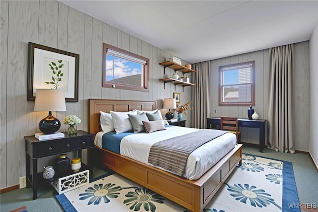 464 Rowley Rd, Cheektowaga, NY 14043 - carpeted bedroom featuring wood walls