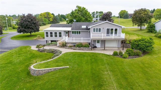 7175 Gale Rd, Lima, NY 14485 - rear view of house featuring a garage, driveway, and a yard