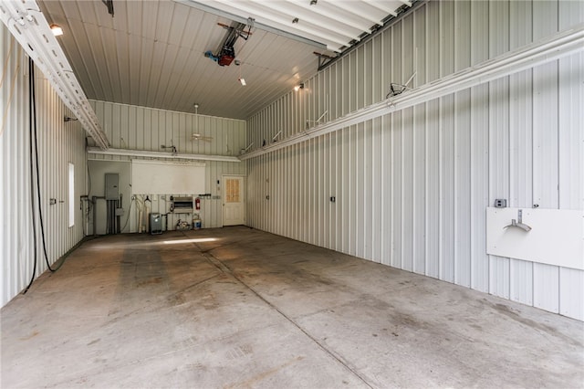 7175 Gale Rd, Lima, NY 14485 - garage featuring electric panel and metal wall
