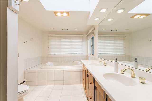 7175 Gale Rd, Lima, NY 14485 - full bath with a garden tub, a baseboard heating unit, recessed lighting, double vanity, and tile patterned floors