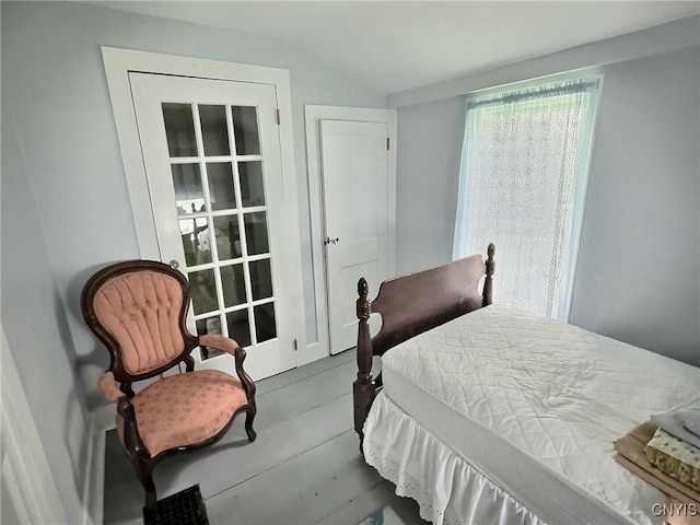 326 Main St, Ledyard, NY 13026 - bedroom with vaulted ceiling and finished concrete flooring