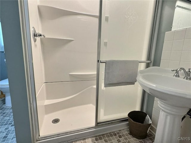 326 Main St, Ledyard, NY 13026 - bathroom with a stall shower, tile walls, and tile patterned flooring