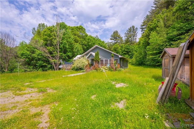 7460 State Highway 29, Oppenheim, NY 13329 - view of yard featuring a forest view and a storage shed