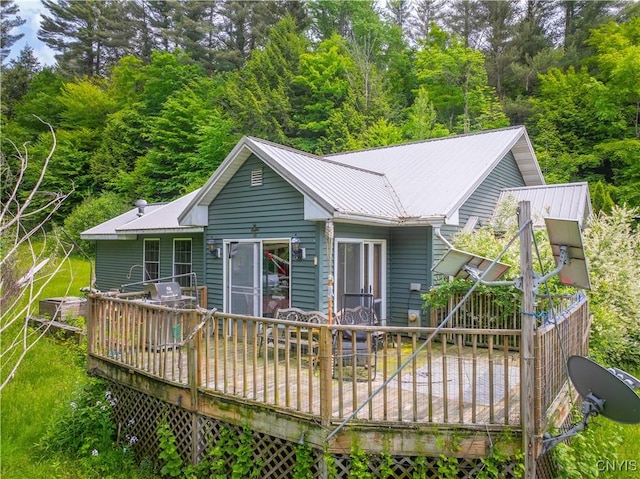 7460 State Highway 29, Oppenheim, NY 13329 - view of front of home with a metal roof and a wooden deck