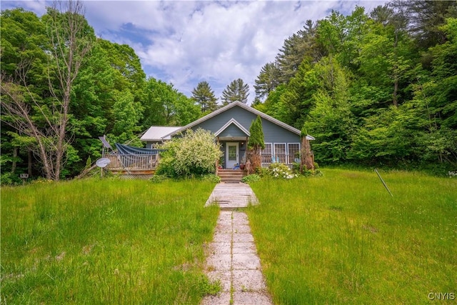 7460 State Highway 29, Oppenheim, NY 13329 - view of front of property with a deck and a forest view