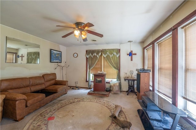 7460 State Highway 29, Oppenheim, NY 13329 - living room with a wood stove and a ceiling fan