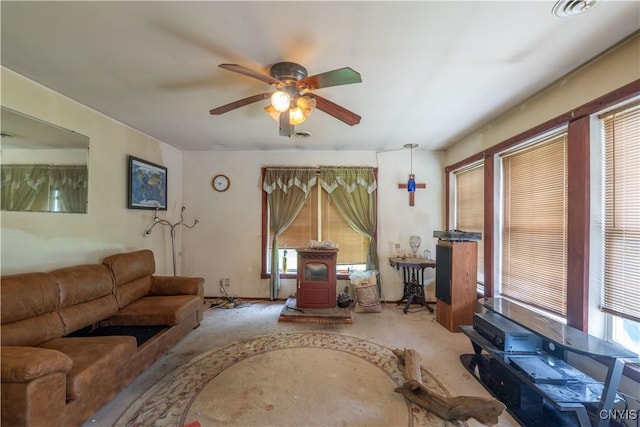 7460 State Highway 29, Oppenheim, NY 13329 - carpeted living area with a wood stove and a ceiling fan