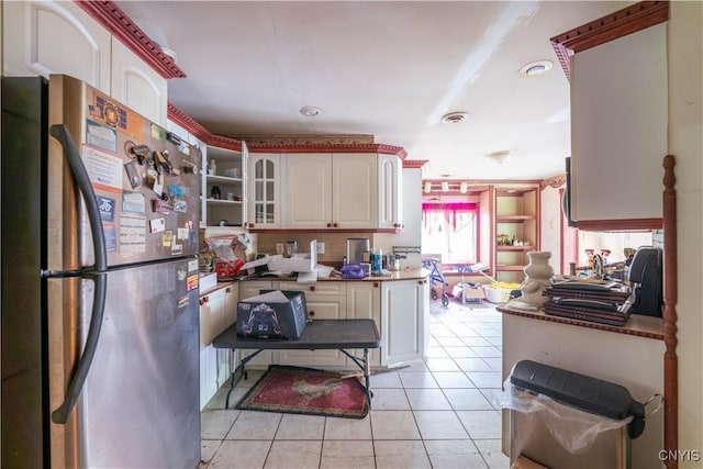 7460 State Highway 29, Oppenheim, NY 13329 - kitchen featuring freestanding refrigerator, light tile patterned floors, white cabinetry, glass insert cabinets, and dark countertops