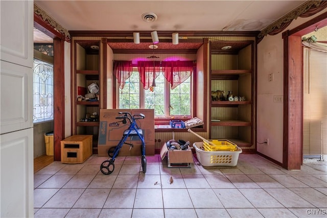 7460 State Highway 29, Oppenheim, NY 13329 - dining room with light tile patterned floors and built in features