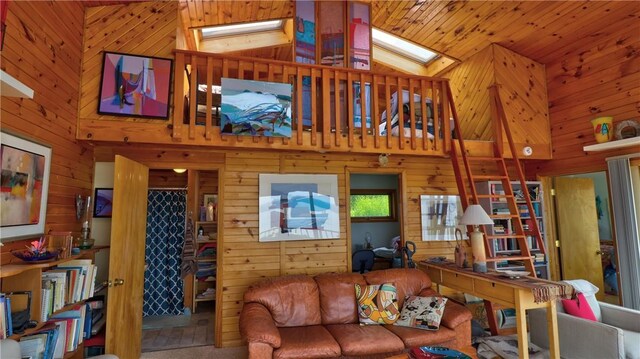 1995 Lake Rd, Ledyard, NY 13026 - living room featuring wooden walls, a skylight, and a towering ceiling
