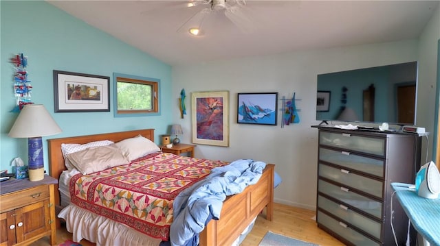 1995 Lake Rd, Ledyard, NY 13026 - bedroom with light wood-style flooring, vaulted ceiling, and ceiling fan