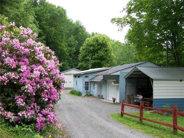236 Covered Bridge Rd, Davenport, NY 13820 - view of front of home featuring an outbuilding and a garage