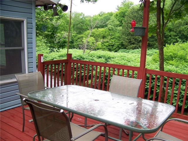 236 Covered Bridge Rd, Davenport, NY 13820 - wooden terrace with outdoor dining area