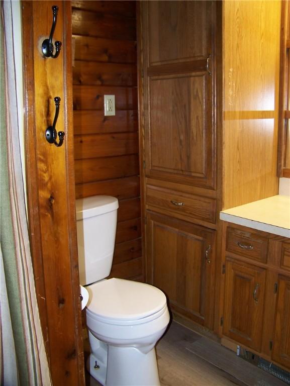 236 Covered Bridge Rd, Davenport, NY 13820 - bathroom with wood finished floors and vanity