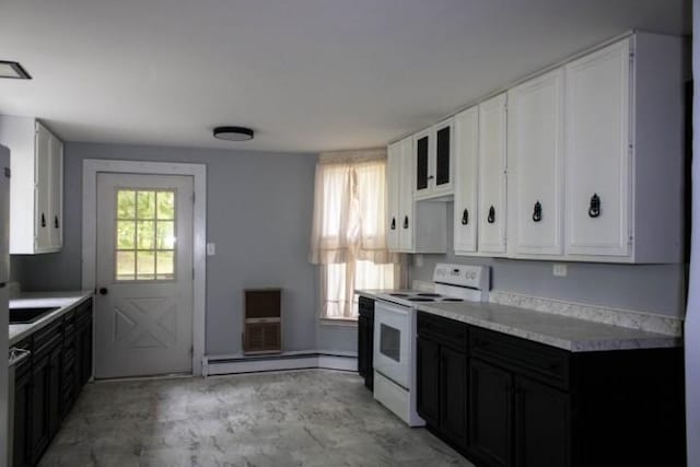 109 S Madison Ave, Dix, NY 14891 - kitchen with white range with electric cooktop, white cabinetry, light countertops, and a baseboard radiator