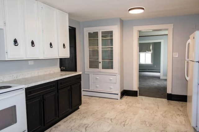 109 S Madison Ave, Dix, NY 14891 - kitchen with white appliances, dark cabinets, white cabinets, and a baseboard heating unit