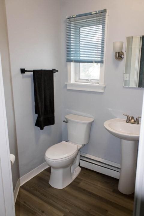 109 S Madison Ave, Dix, NY 14891 - bathroom with a baseboard radiator and wood finished floors