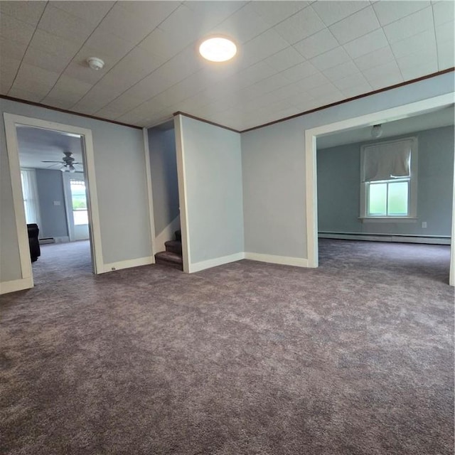 109 S Madison Ave, Dix, NY 14891 - unfurnished room featuring dark colored carpet, stairs, a smoke detector, and baseboard heating