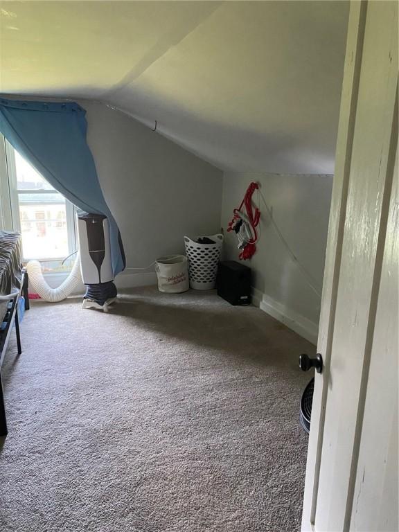 25 N Academy St, Middlebury, NY 14591 - additional living space with lofted ceiling and carpet