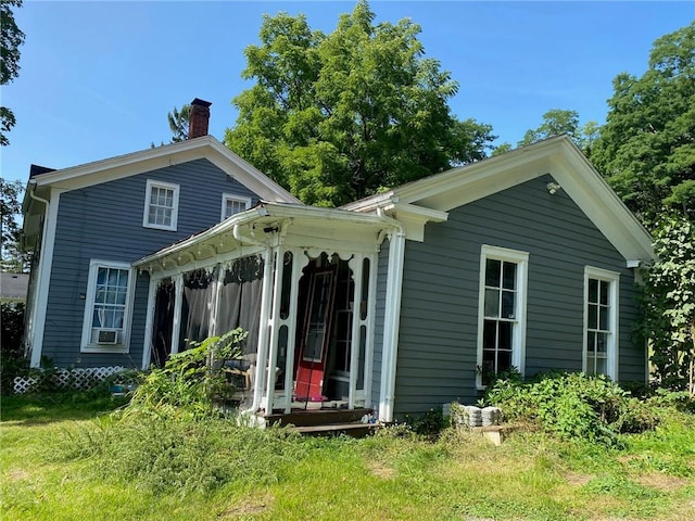 25 N Academy St, Middlebury, NY 14591 - rear view of house with a chimney