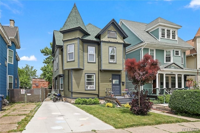 228 Potomac Ave, Buffalo, NY 14213 - victorian house with a porch, a shingled roof, and driveway